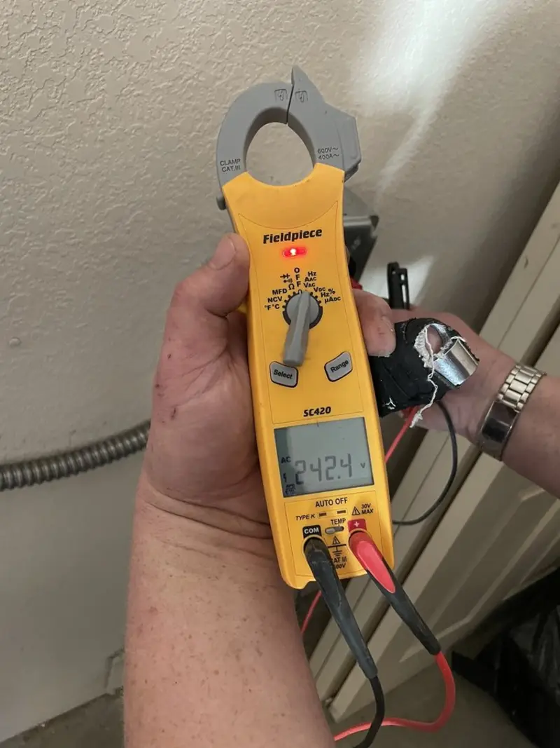 Voltage testing with clamp meter during Circuit Breaker Repair in Baton Rouge